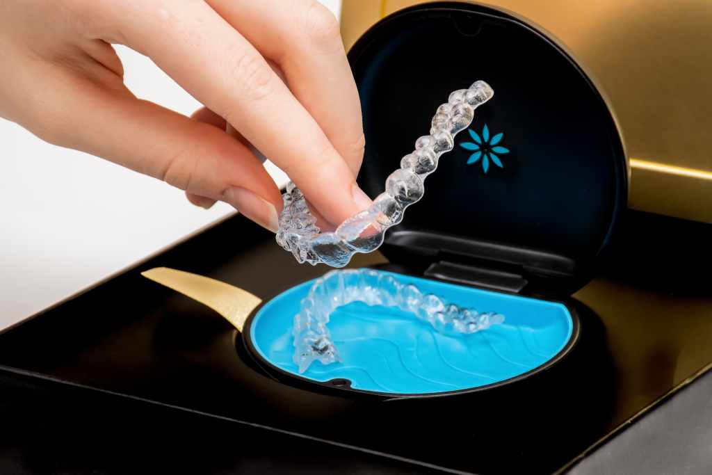 Sydney, Australia, 2021-08-23 Invisalign aligners in a storage carry case. Invisible braces. Clear teeth straighteners. Clear plastic bracers